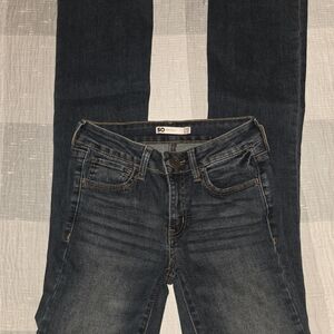 SO Women's Dark Indigo Low rise Bootcut Jeans